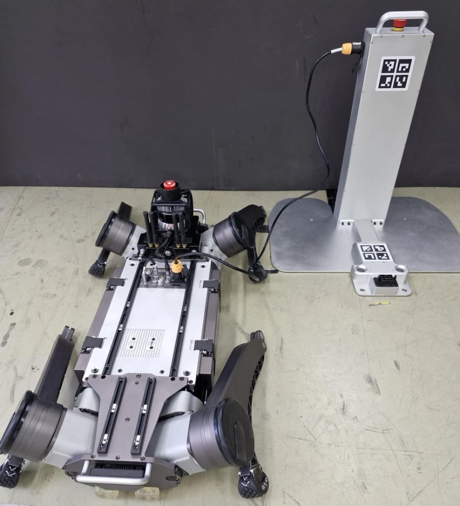 Inspection quadruped robot connected to docking station