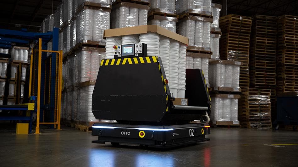 OTTO heavy-duty AMR transporting palletized loads in a warehouse