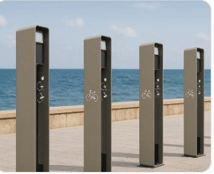 Corrosion-resistant outdoor charging bollards along a seaside promenade