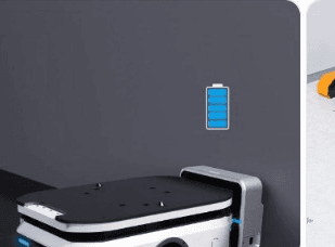 Robot docked at a wall charging port with battery status indicator
